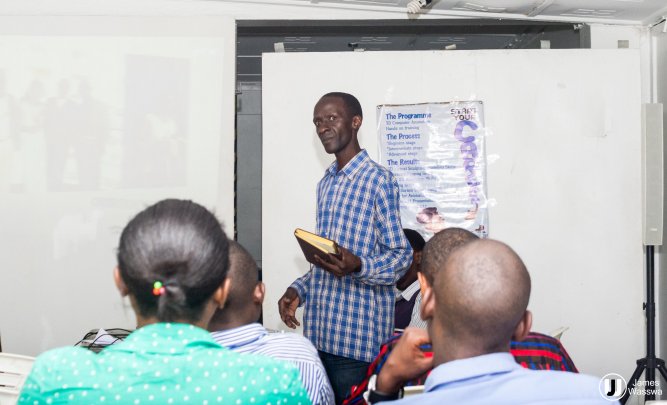 David Masanso talks to participants at the 3D Animation workshop yesterday