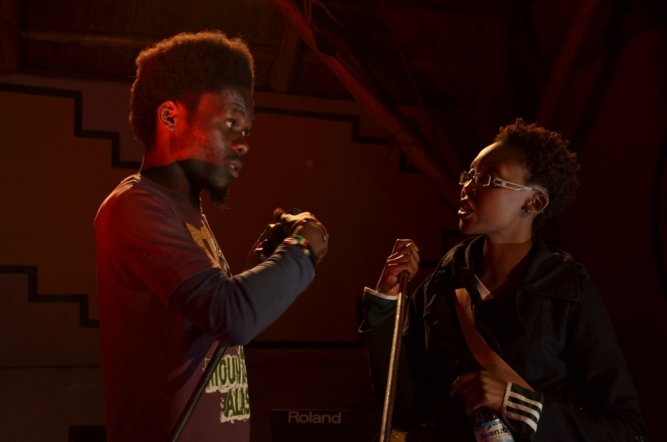 Arnold Aganze discussing his film on a previous screening in Kampala