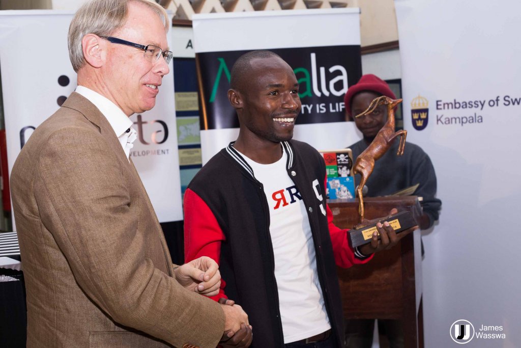 The Forbidden's cinematographer receives the award for best Film on behalf of